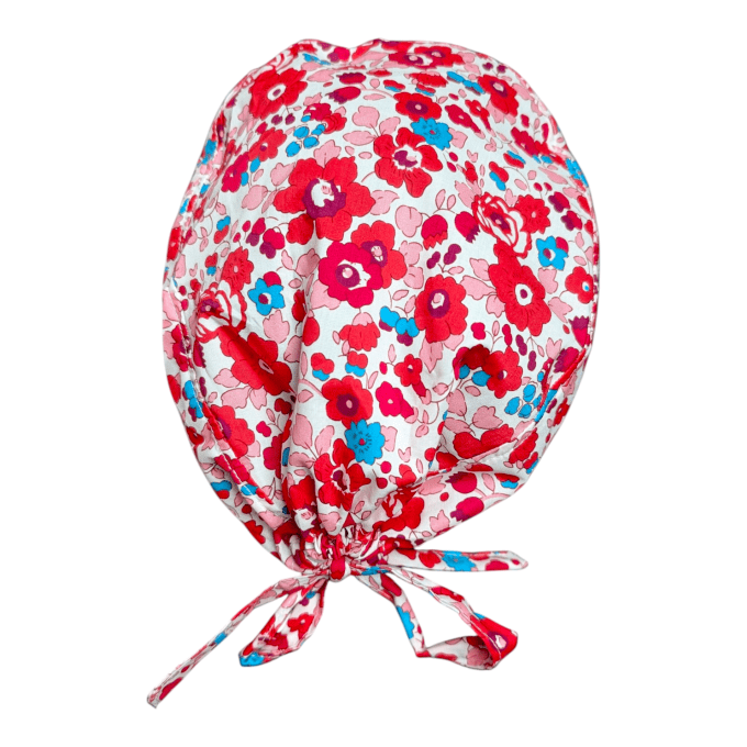 Avec son motif de fleurs rouges éclatantes rehaussées de touches de bleu turquoise et de rose tendre