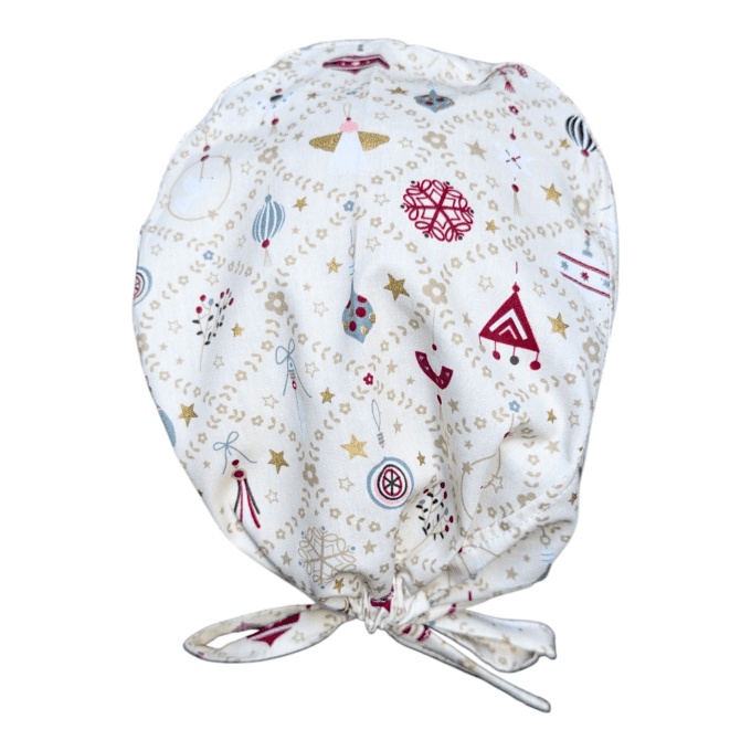 ses motifs dorés et rouges sur fond blanc évoquent la beauté de l’hiver et la magie des fêtes, tout 