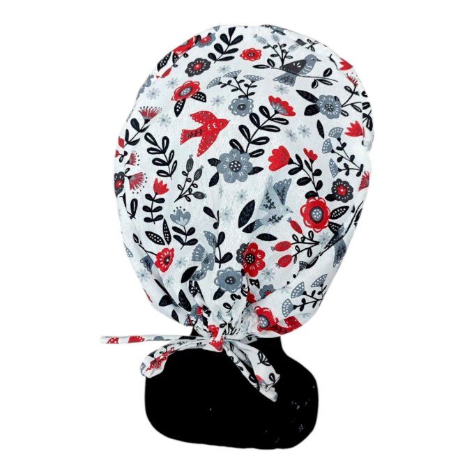 des colombes rouges, des fleurs rouges, grises et noires et un feuillage raffiné sur fond blanc text