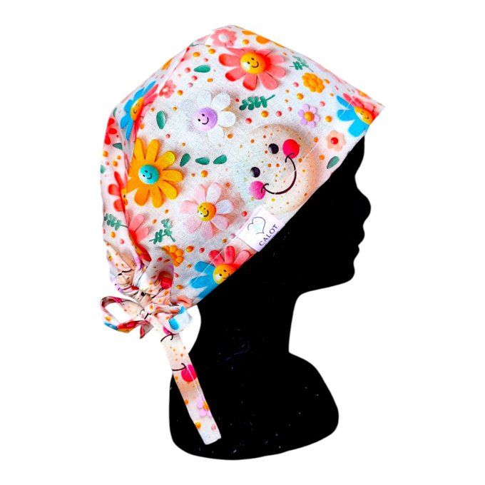 des fleurs aux visages souriants dans un tourbillon de couleurs vives sur fond clair – impossible de